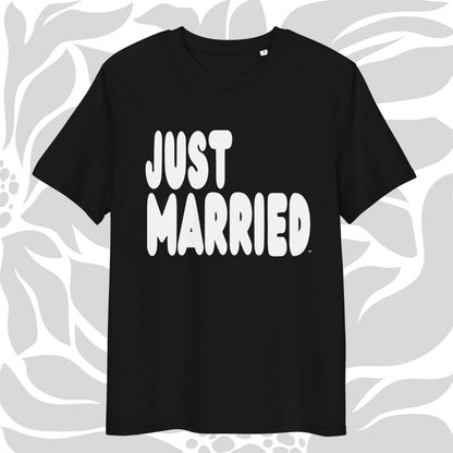 Black t-shirt with 'JUST MARRIED' text on a gray patterned background