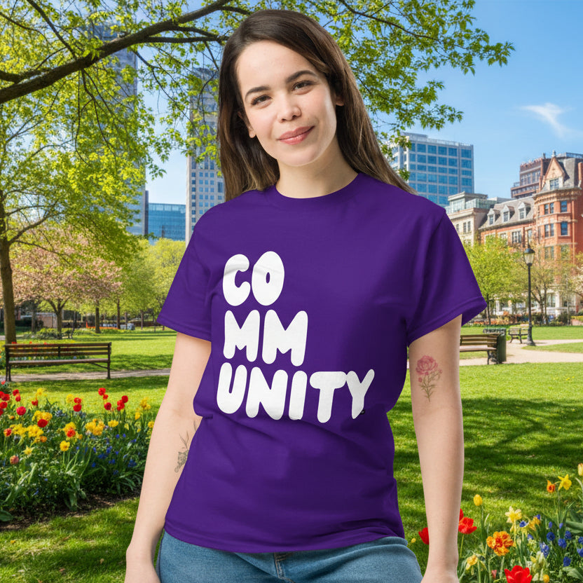 Woman wearing A Community in Purple Flowers Unisex T-Shirt from the APWT Gift Shop