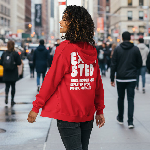 Woman wearing Exhausted in Red Unisex Zip-Up Hoodie from the APWT Gift Shop