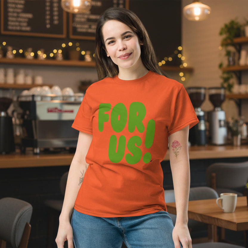 Woman wearing the APWT Gift Shop's For Us in Orange and Green Unisex T-Shirt from the For Us Collection