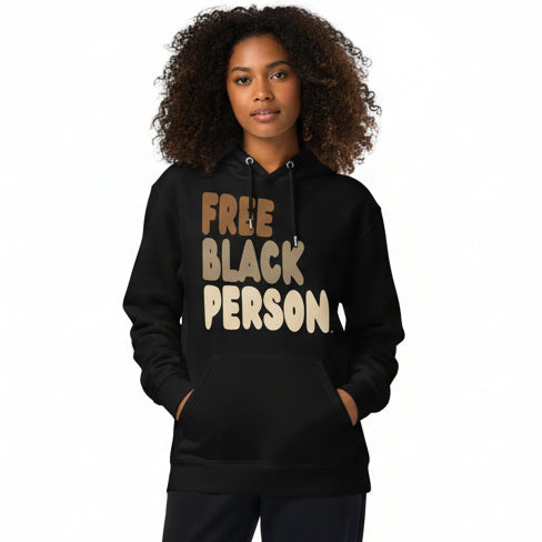 Woman wearing Free Black Person Premium Unisex Hoodie from The APWT Gift Shop