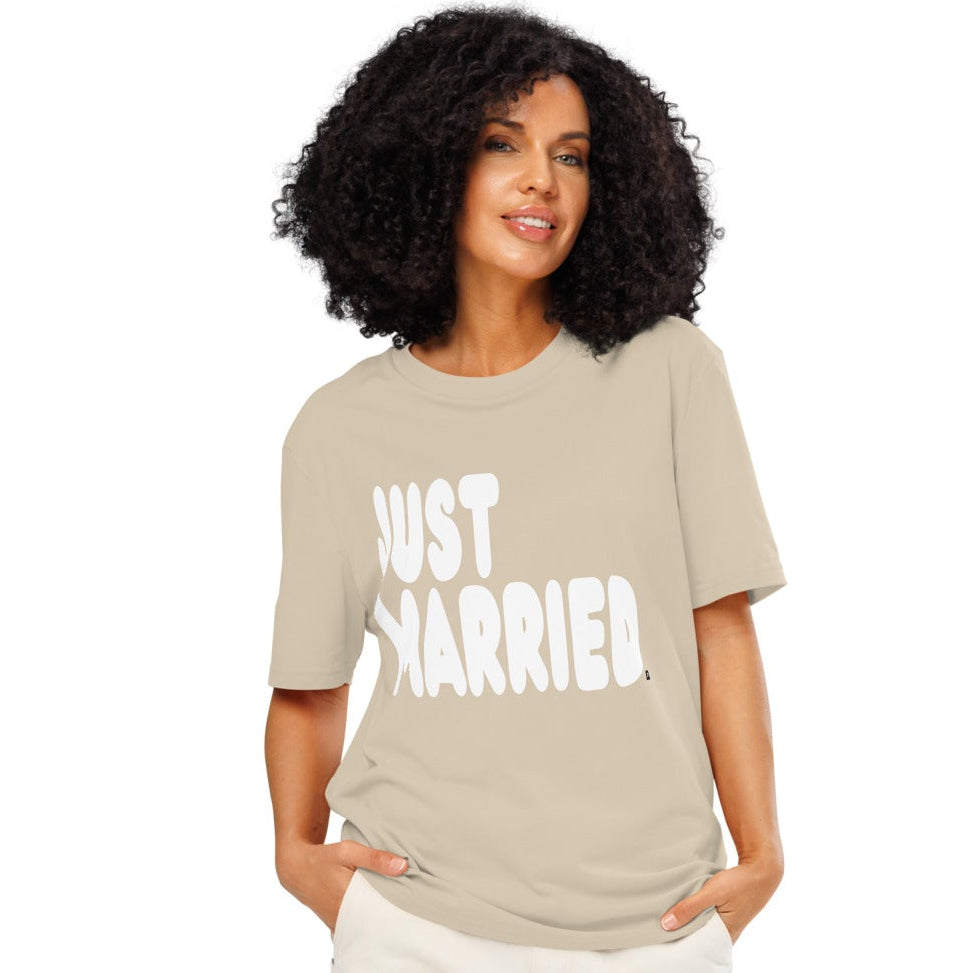 Woman wearing Just Married Premium Unisex T-Shirt in Beige