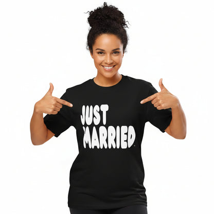 Woman wearing the APWT Gift Shop's Just Married Premium Unisex T-Shirt in Black from the APWT Wedding Shop