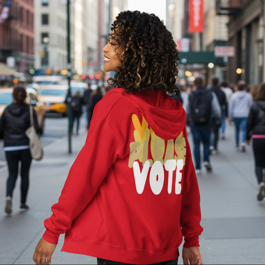 Woman wearing Please Vote in Cautionary Red Unisex Zip-Up Hoodie from the APWT Gift Shop