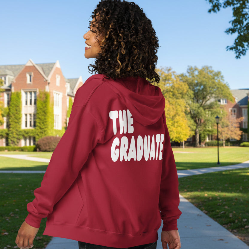 Woman wearing The Graduate Unisex Zip-Up Hoodie from the APWT Gift Shop in Red