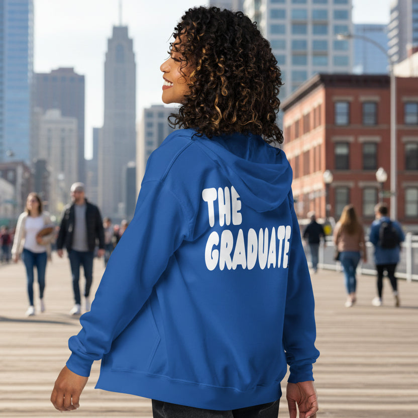 Woman wearing The Graduate Unisex Zip-Up Hoodie from the APWT Gift Shop in Royal Blue