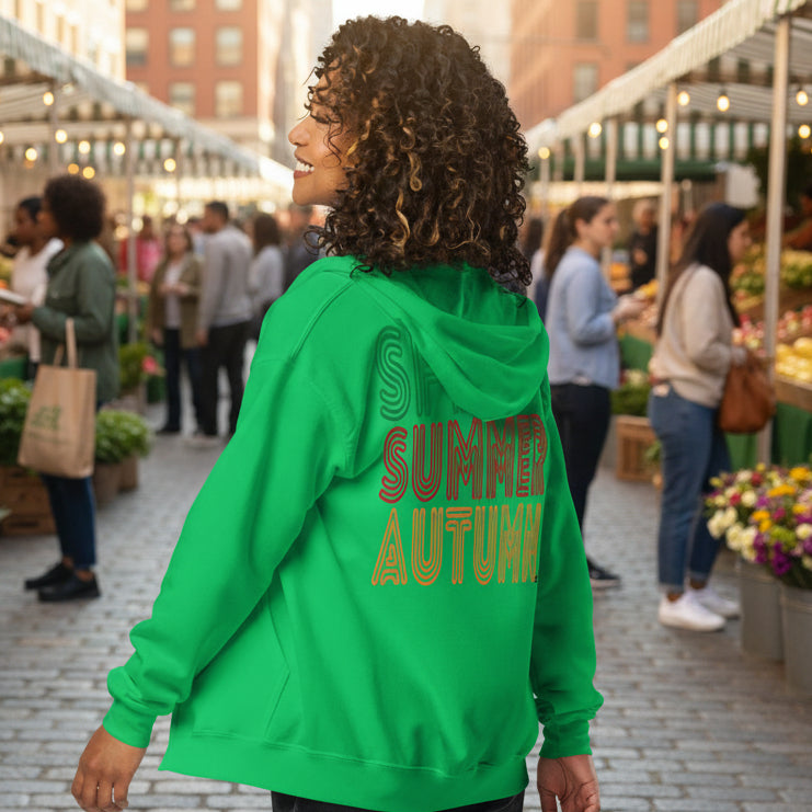 Woman wearing The Spring into Summer Unisex Zip-Up Hoodie in Green from the APWT Gift Shop