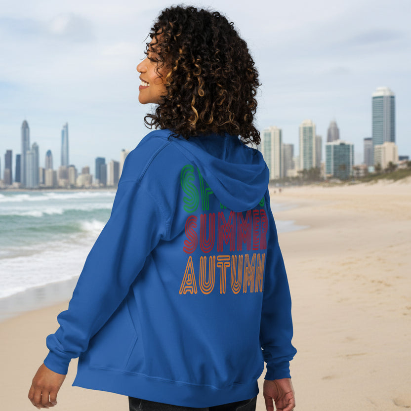 Woman wearing The Spring into Summer Unisex Zip-Up Hoodie in Royal Blue from the APWT Gift Shop