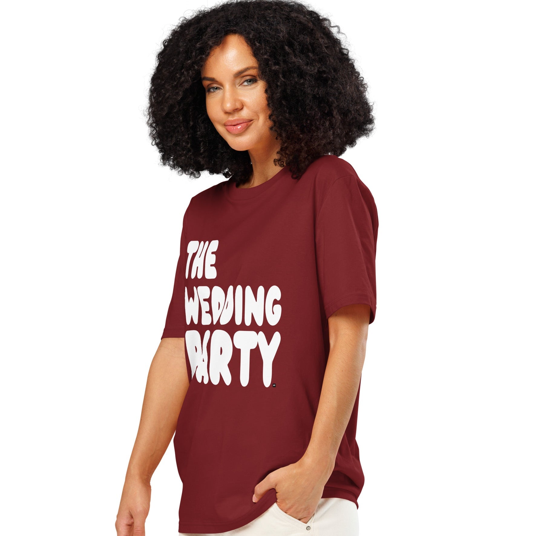 Woman wearing The Wedding Party Premium Unisex T-Shirt in Burgundy from the APWT Gift Shop Side