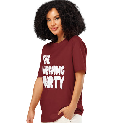 Woman wearing The Wedding Party Premium Unisex T-Shirt in Burgundy from the APWT Gift Shop Side