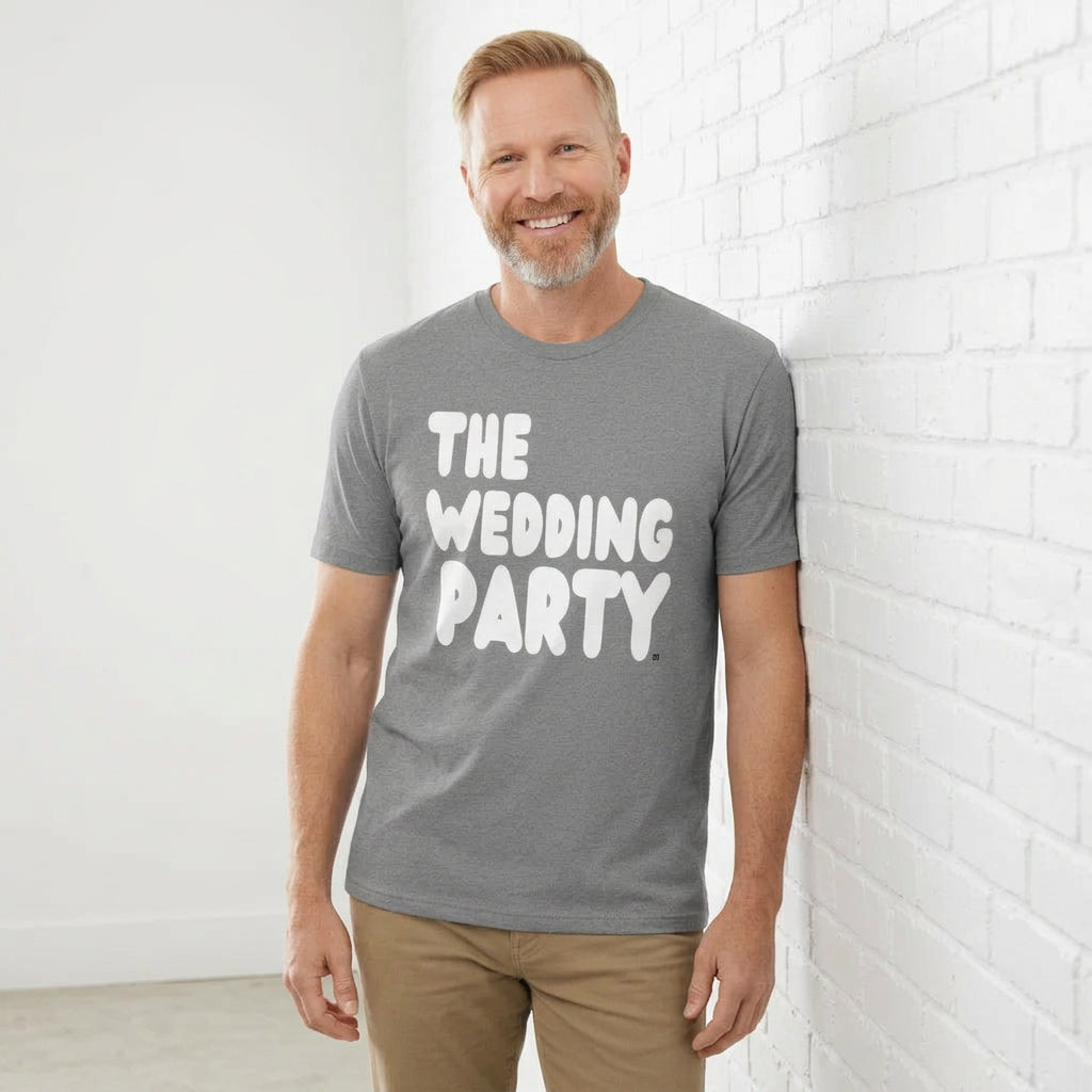 man wearing the APWT Gift Shop's the Wedding Party Premium Unisex T-Shirt from the APWT Wedding Shop in Grey