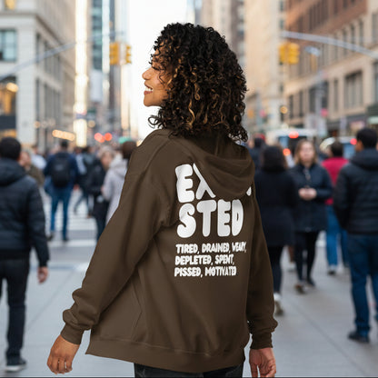 Woman wearing the Exhausted in Brown Unisex Zip-Up Hoodie from the APWT Gift Shop