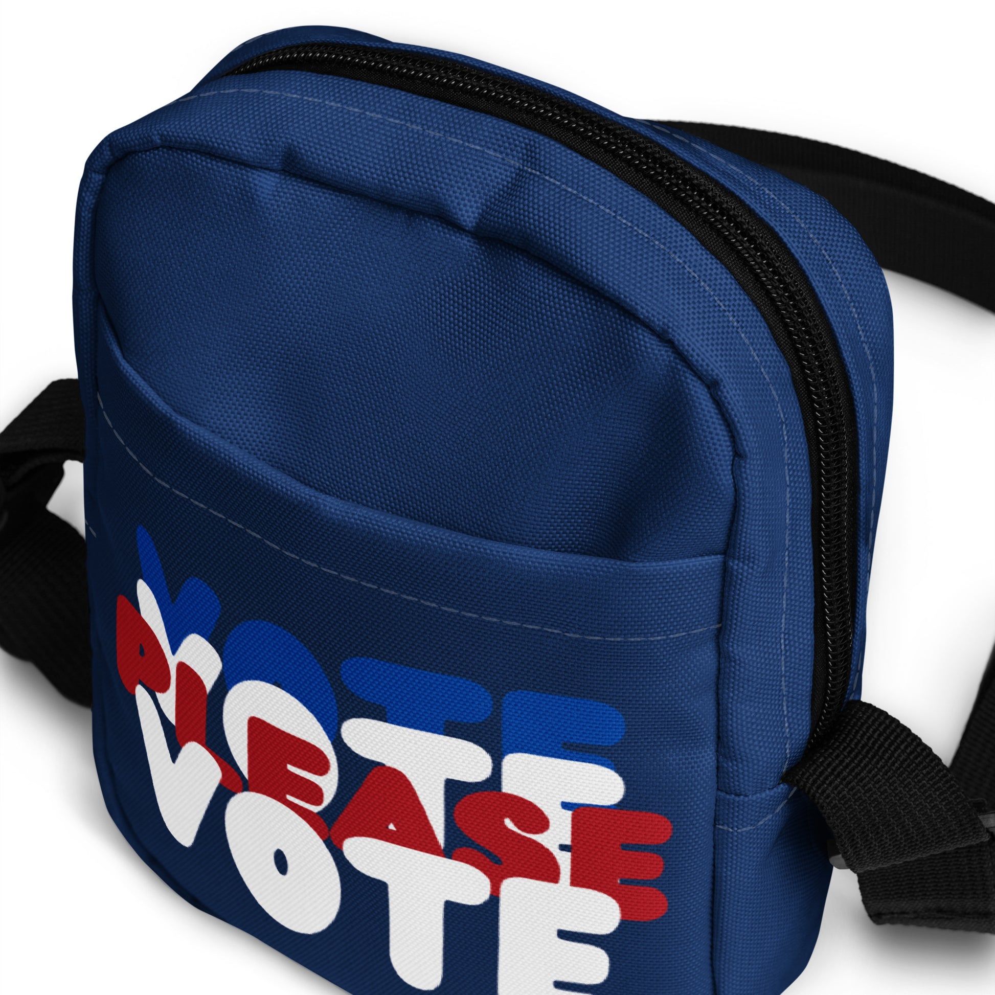 The front of The APWT Gift Shop's Please Vote Small Crossbody Bag from the APWT Vote Shop