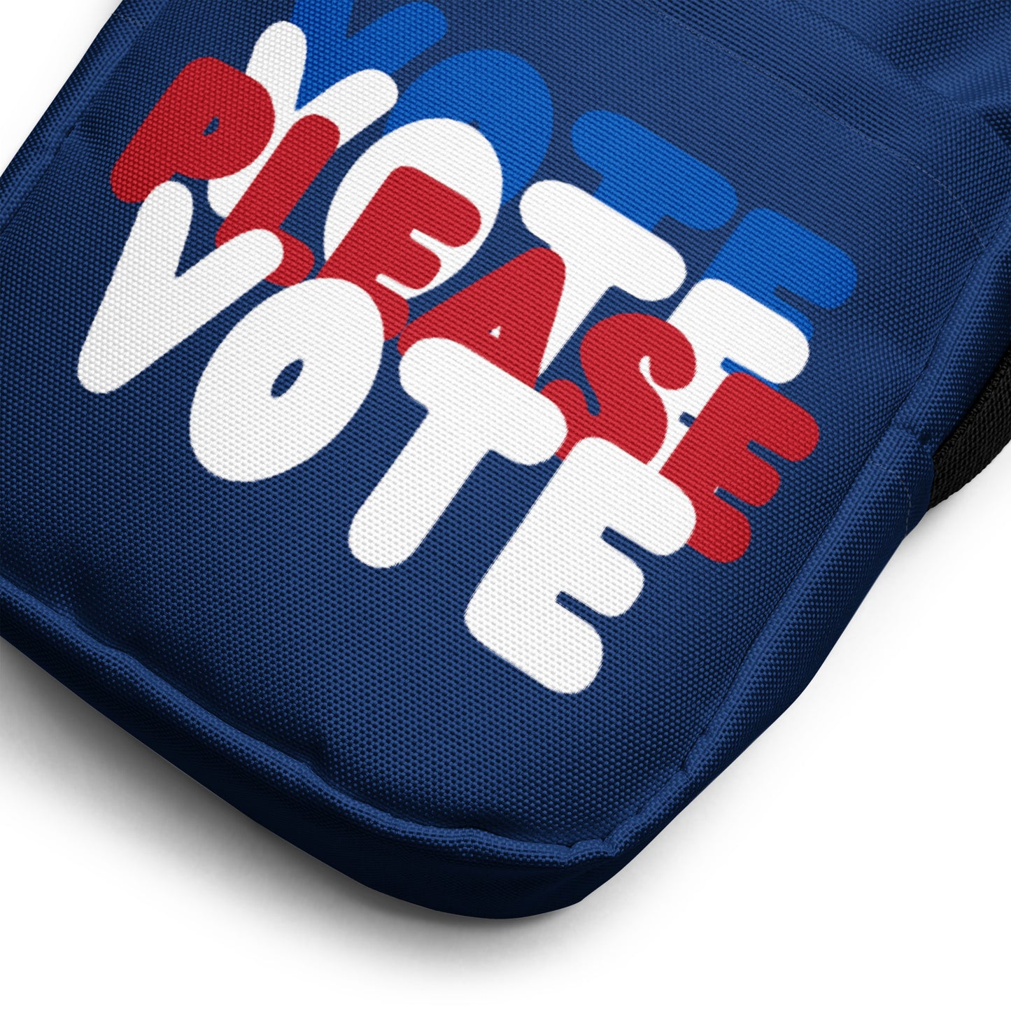 Close up of the front of the The APWT Gift Shop's Please Vote Small Crossbody Bag from the APWT Vote Shop