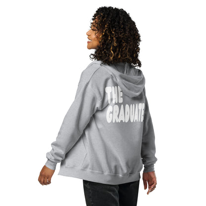Woman wearing The Graduate Unisex Zip-Up Hoodie from the APWT Gift Shop in Grey