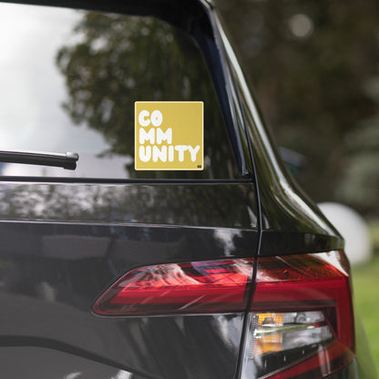 A Community in Yellow Vinyl Sticker on a back car window - The APWT Gift Shop