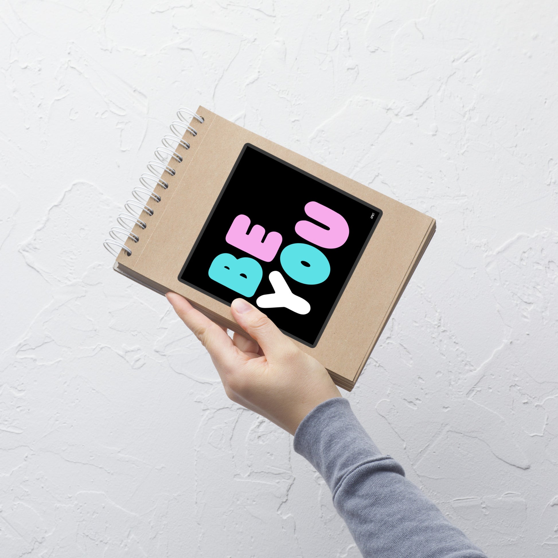 The Be You T Vinyl Sticker on a notebook - The APWT Gift Shop