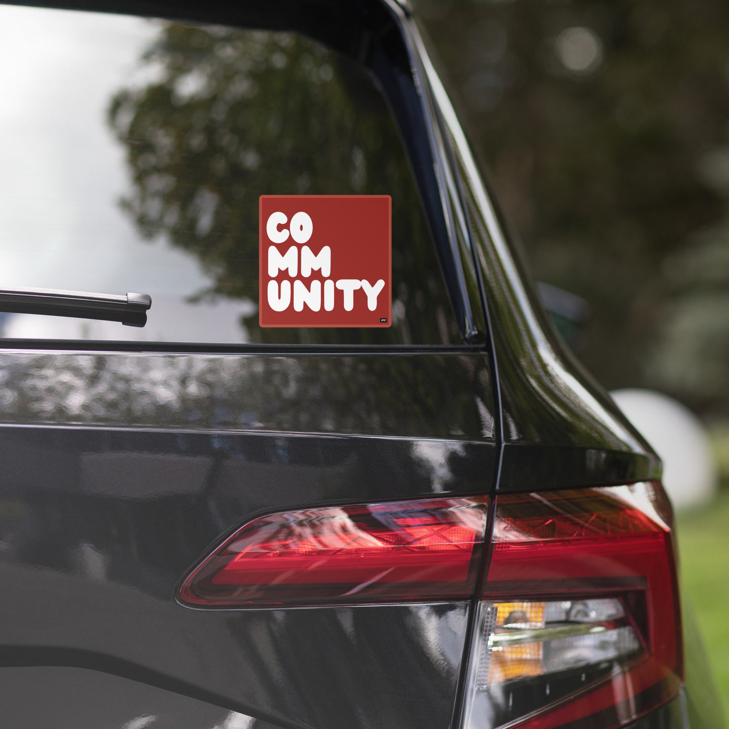 A Community in Apple Red Vinyl Sticker