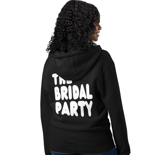Woman wearing The Bridal Party Premium Unisex Zip-Up Hoodie in Black