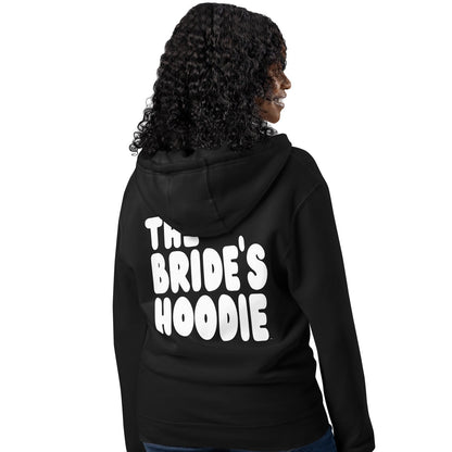 Woman wearing The Bride's Hoodie Premium Unisex Zip-Up Hoodie in Black