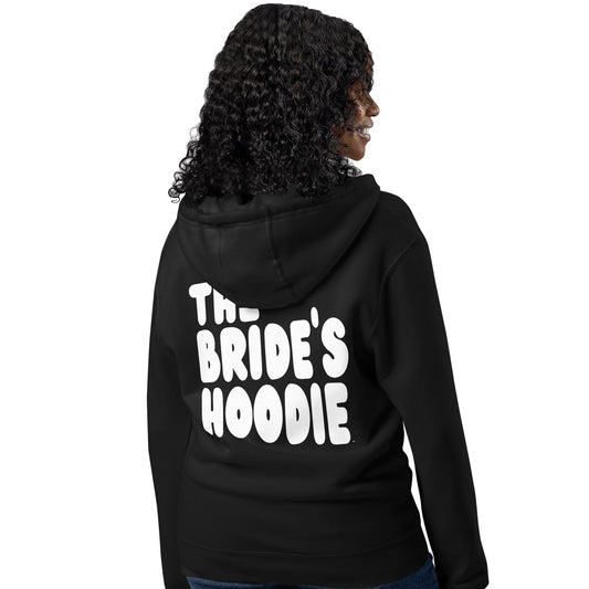 Woman wearing The Bride's Hoodie Premium Unisex Zip-Up Hoodie in Black