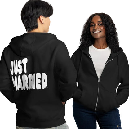 couple wearing Just Married Premium Unisex Zip-Up Hoodie in Black