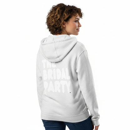 Woman wearing the APWT Gift Shop's the Bridal Party Premium Unisex Zip-Up Hoodie from the APWT Wedding Shop in Grey