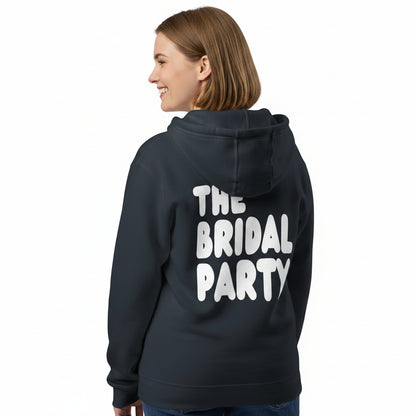 Woman wearing the APWT Gift Shop's the Bridal Party Premium Unisex Zip-Up Hoodie from the APWT Wedding Shop in Navy Blue