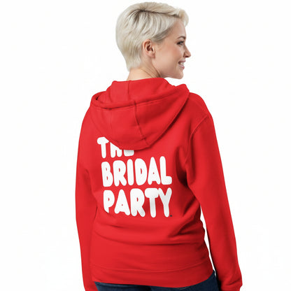 Woman wearing the APWT Gift Shop's the Bridal Party Premium Unisex Zip-Up Hoodie from the APWT Wedding Shop in Red