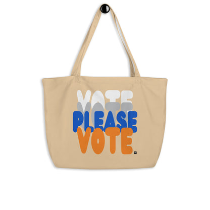 The APWT Gift Shop's Please Vote in Blue and Orange Jumbo Tote Bag from the APWT Gift Shop in Natural