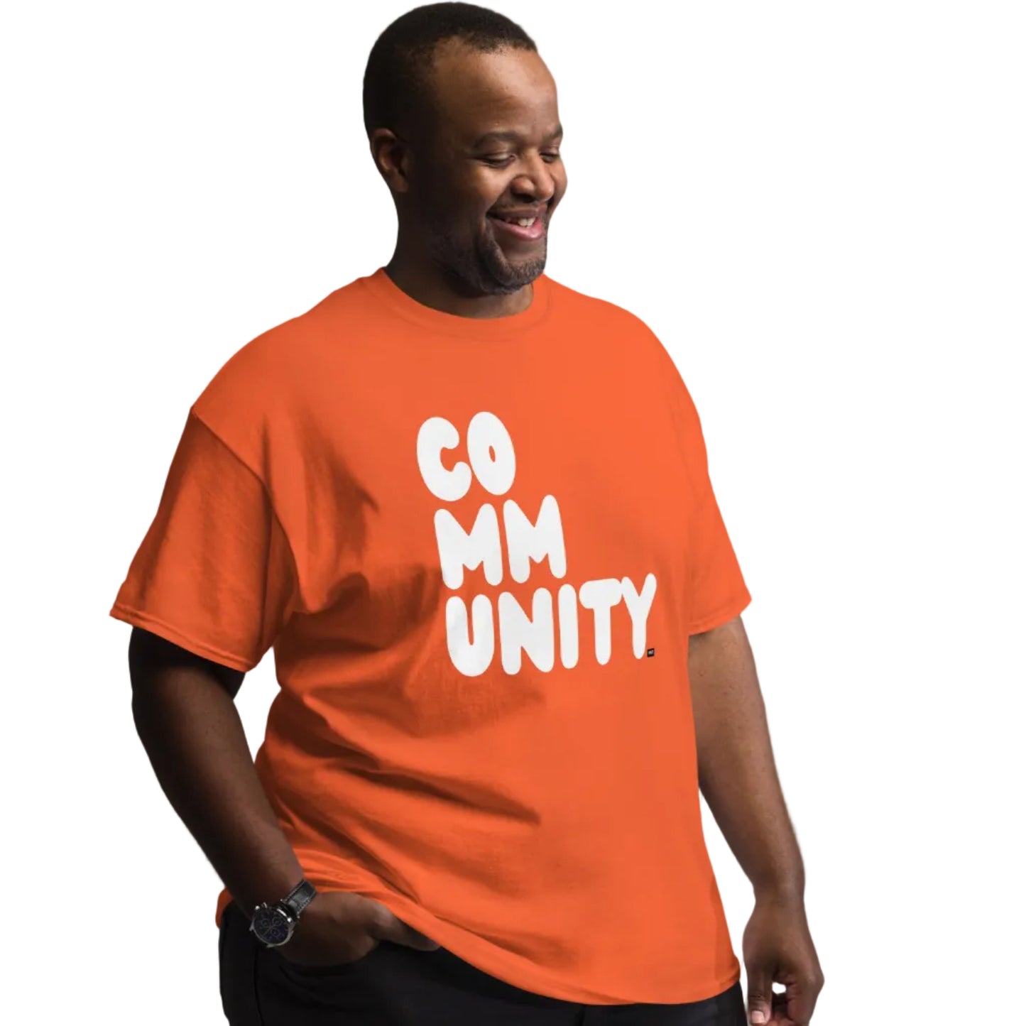 man wearing A Community in Orange Citrus Unisex T-Shirt from the APWT Gift Shop inclusive sizing