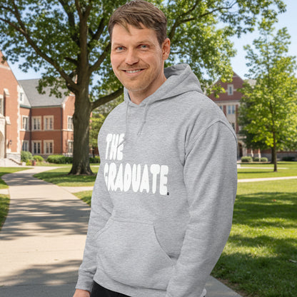 man wearing The Graduate Unisex Hoodie in Grey from the APWT Gift Shop
