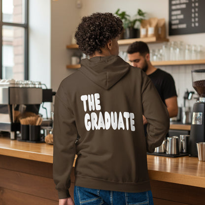 man wearing The Graduate Unisex Zip-Up Hoodie from the APWT Gift Shop in Brown