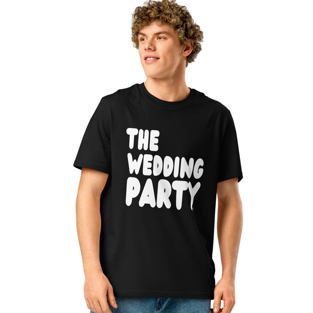 man wearing The Wedding Party Premium Unisex T-Shirt in Black from the APWT Gift Shop