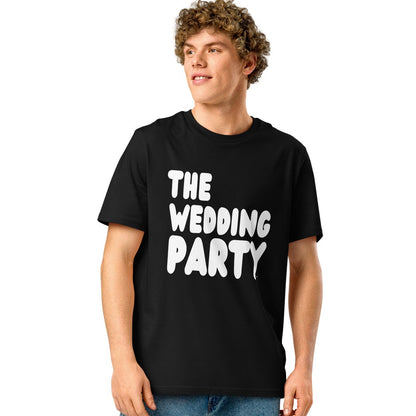 man wearing The Wedding Party Premium Unisex T-Shirt in Black from the APWT Gift Shop