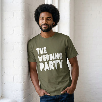 man wearing The Wedding Party Premium Unisex T-Shirt in Olive Green from the APWT Gift Shop