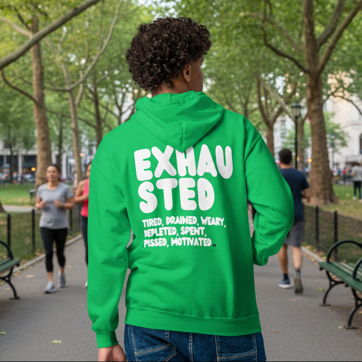 man wearing the Exhausted in Green Unisex Zip-Up Hoodie from the APWT Gift Shop