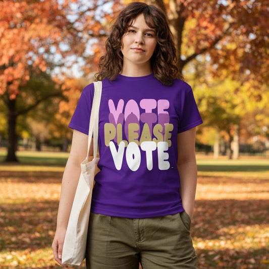 Woman in the park on an autumn day wearing the APWT Gift Shop's Please Vote in Purple Flowers Unisex T-Shirt from the APWT Vote Shop