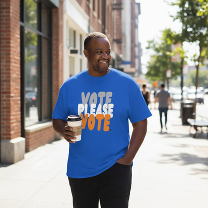 Man walking down the street carrying a cup pf coffee wearing the APWT Gift Shop's Please Vote in Blue and Orange Unisex T-Shirt from the Community Collection