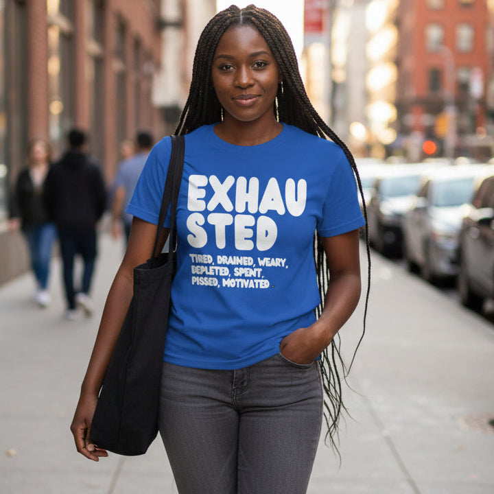 Woman walking down the street wearing the APWT Gift Shop's Exhausted in Blue Unisex T-Shirt from the Exhausted Collection