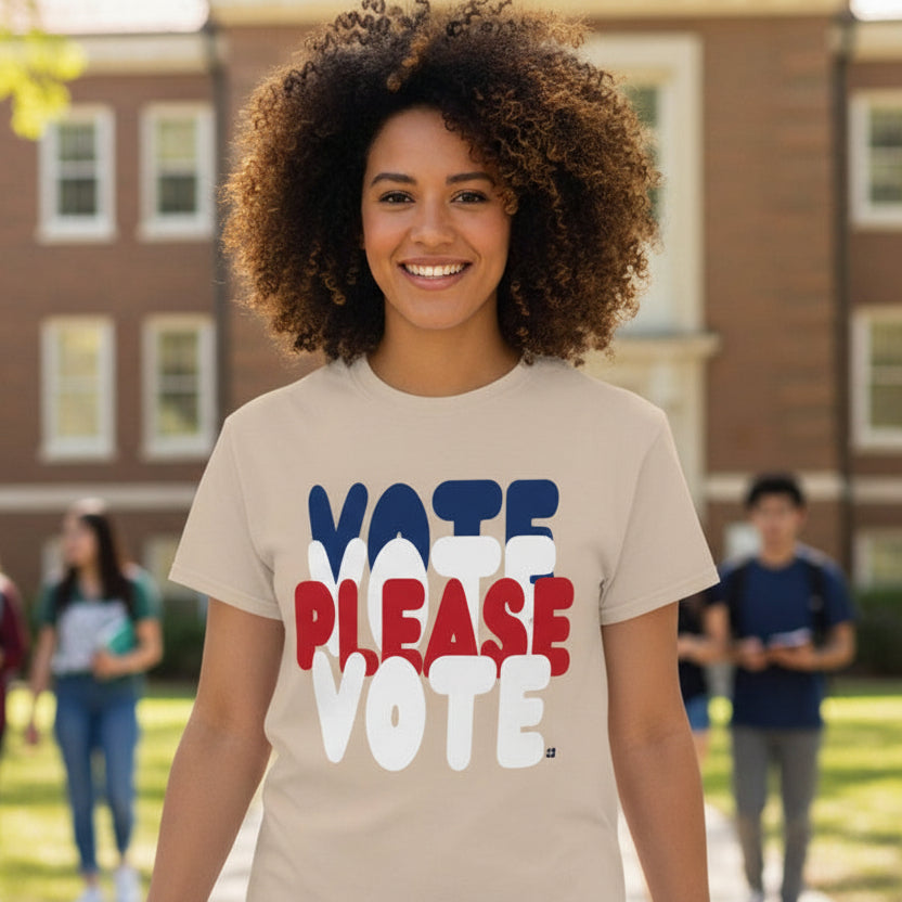 Woman wearing the APWT Gift Shop's Please Vote Unisex T-Shirt from the APWT Vote Shop in Beige 