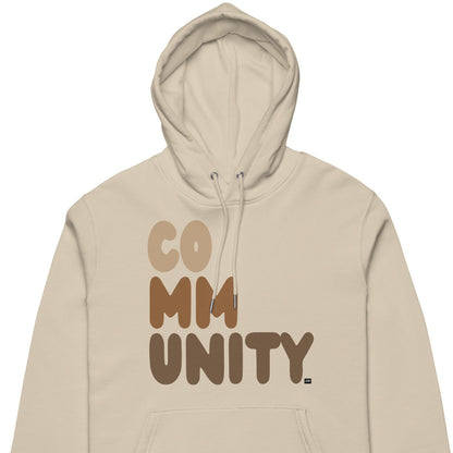 The APWT Gift Shop's Our Community Premium Unisex Hoodie from the Community Collection and the Premium Basics Collection in Beige - Close-Up Front