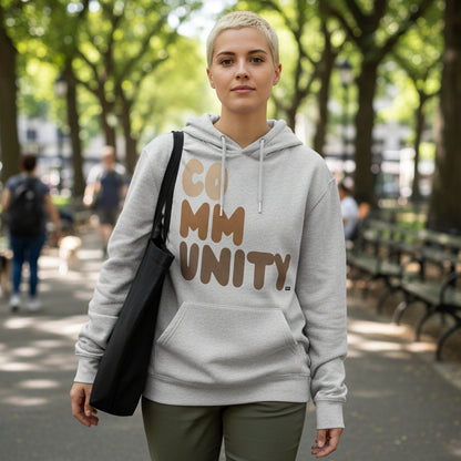 Woman wearing The APWT Gift Shop's Our Community Premium Unisex Hoodie from the Community Collection and the Premium Basics Collection in Grey