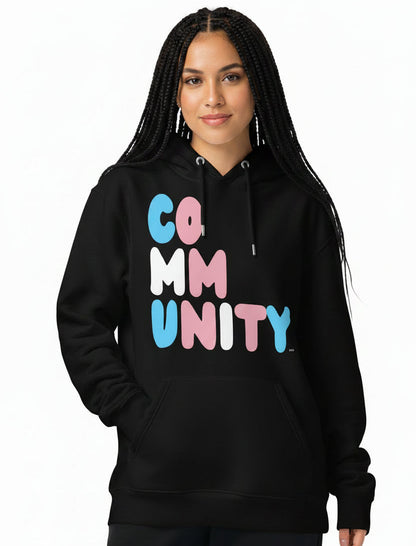 Person wearing the APWT Gift Shop's Be you Community Premium Unisex Hoodie from the Community Collection and the Pride in the APWT Gift Shop Collection