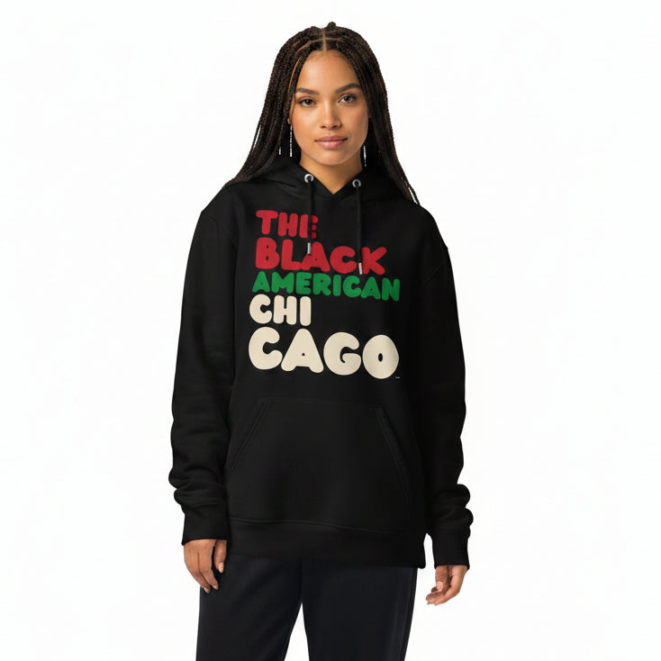 Woman wearing the APWT Gift Shop's the Black American Chicago Premium Unisex Hoodie from the Black Collection