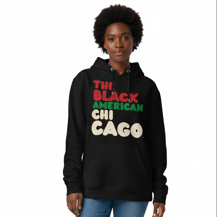 Woman wearing the APWT Gift Shop's the Black American Chicago Premium Unisex Hoodie from the Black Collection