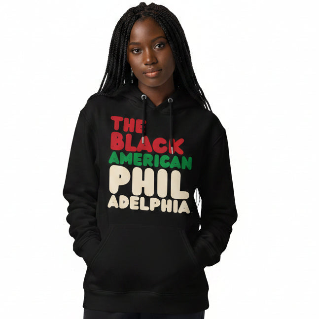 Woman wearing the APWT Gift Shop's the Black American Philadelphia Premium Unisex Hoodie from the Black Collection