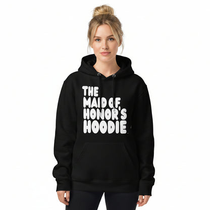 Woman wearing the APWT Gift Shop's Maid of Honor's Hoodie Premium Unisex Hoodie from the APWT Wedding Shop in Black