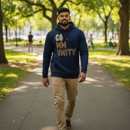 Man wearing The APWT Gift Shop's Our Community Premium Unisex Hoodie from the Community Collection and the Premium Basics Collection in Navy Blue
