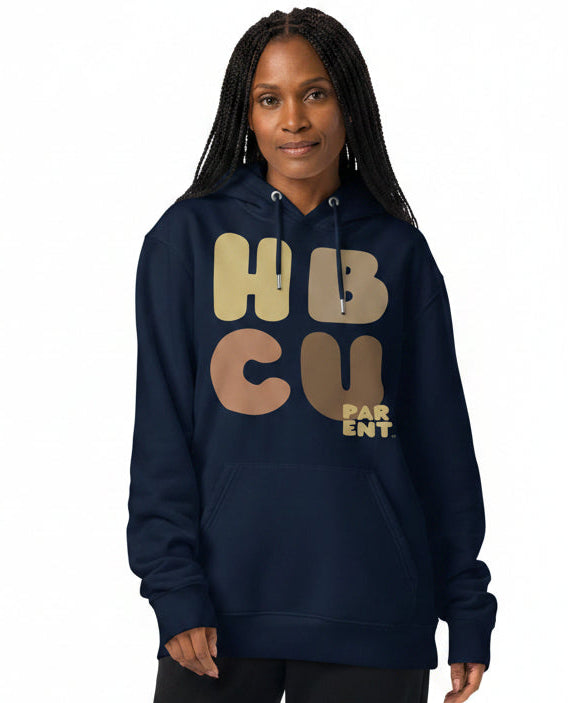 Woman wearing the APWT Gift Shop's HBCU Parent Premium Unisex Hoodie from the Black Collection and the Premium Basics Collection